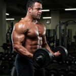Muscular endomorph bodybuilder lifting weights in a gym, showcasing strength and determination