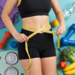 Person measuring waist and hips with a tape measure, surrounded by fitness and nutrition elements