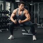 Mesomorph individual exercising in a gym, showcasing strength and athleticism